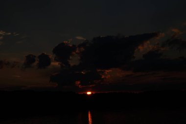 picturesque view of endless sea with beautiful sunrise at sky 