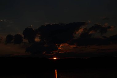 picturesque view of endless sea with beautiful sunrise at sky 