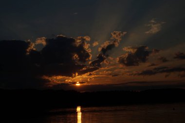 picturesque view of endless sea with beautiful sunrise at sky 