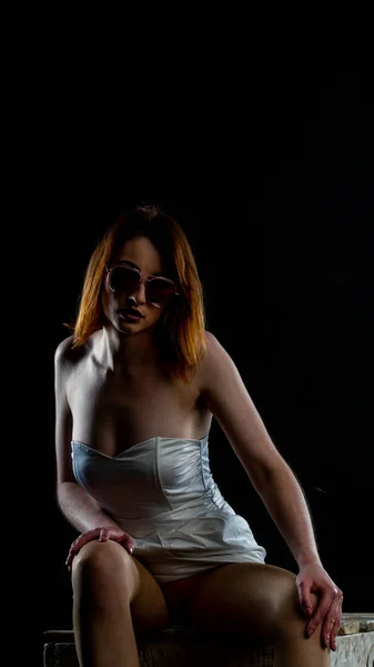 Beautiful Woman White Dress Sunglasses Posing Dark Background — Stock Photo, Image