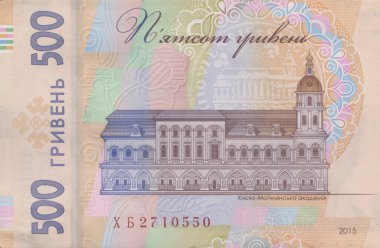 A lot of Ukrainian hryvnias, face value 500 hryvnias on a black background, nicely laid out money on black