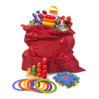 birçok oyuncak ile büyük kırmızı çanta