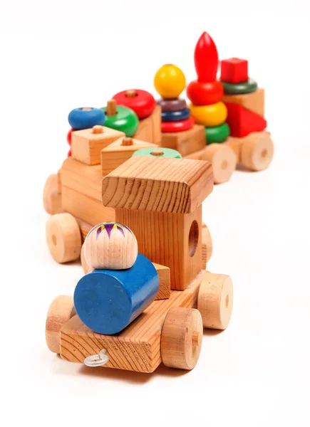 Dřevěný vlak puzzle s trenéry — Stock fotografie