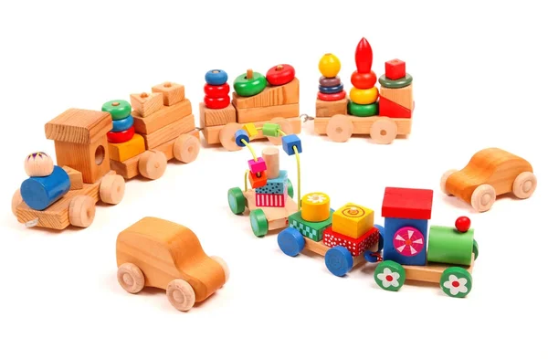 Wooden trains and cars puzzle with coaches — Stock Photo, Image
