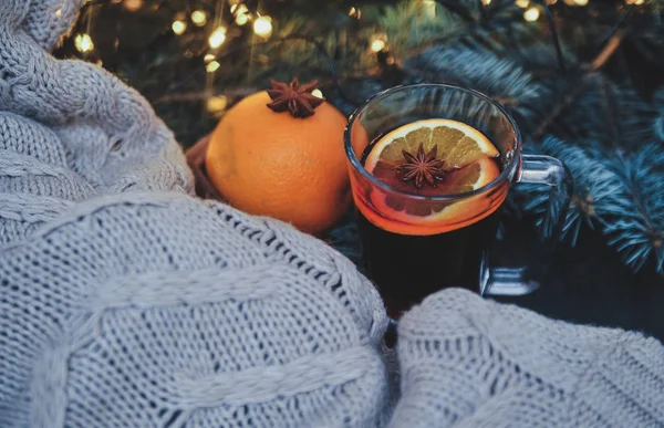 Stylized photo of a mulled wine on a christmas background — Stock Photo, Image