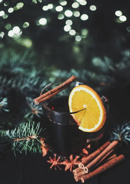 Stylized photo of a mulled wine on a christmas background — Stock Photo, Image