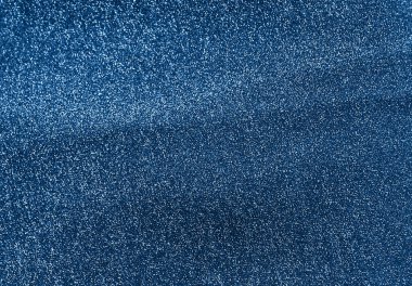 Parlak kumaşın dokusu son moda mavi renkte.  