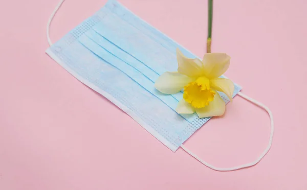 Protective medicine mask with flower.