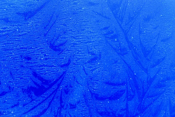 Wzorce lodu na szybie niebieski — Zdjęcie stockowe
