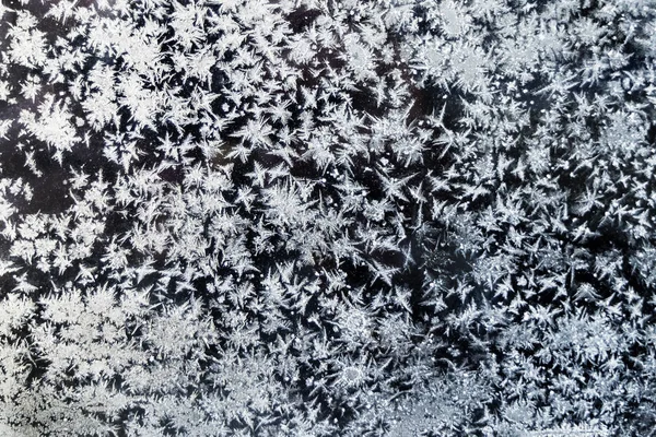 Modele de gheață pe sticla neagră — Fotografie, imagine de stoc