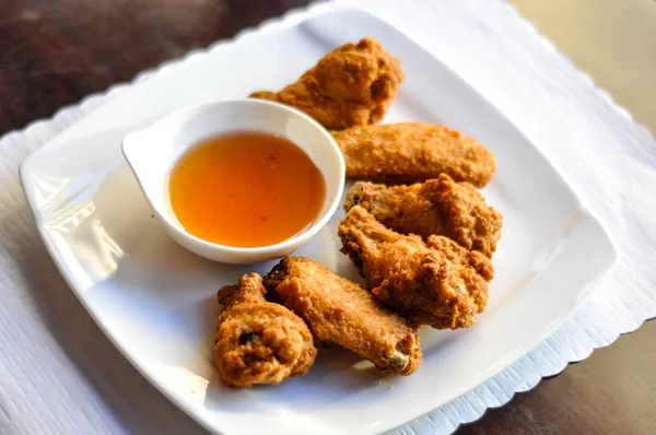 Chicken Wings, Deep fried chicken wings lightly marinated with our own homemade sauce