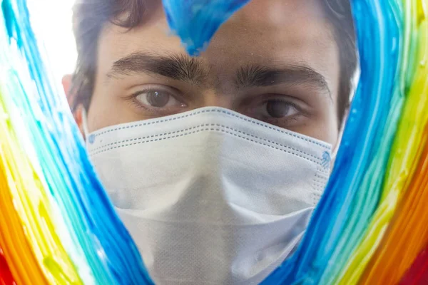 Coronavirus Quarantined Stay Home Guy Looking Rainbow While Sitting Window — Stock Photo, Image