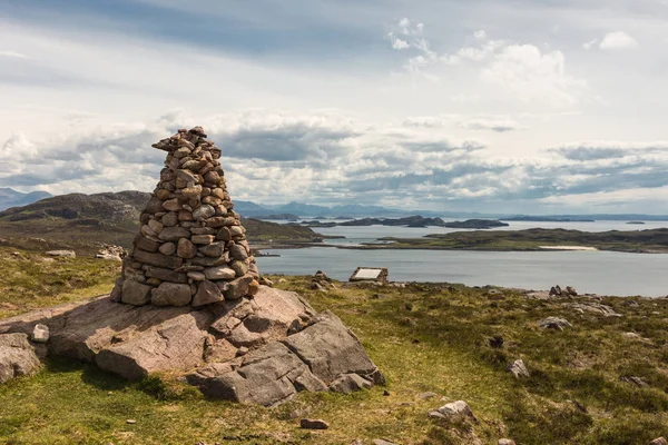 Stone marker above Altandhu hamlet, Scotland.