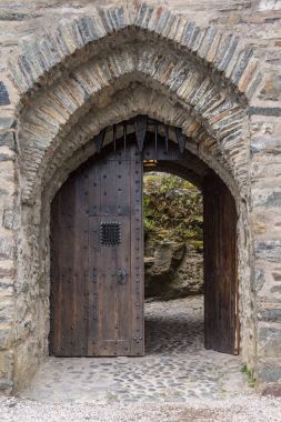 Entrance door to Eilean Donan Castle, Scotland. clipart