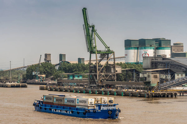 Transimex small river container vessel on Long Tau River, Phuoc 