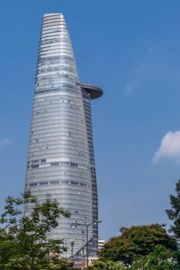 Bitexco Finans Kulesi mavi gökyüzüne karşı, Ho Chi Minh City, V