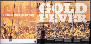 Docklands, Melbourne, Austra 'daki posterlerde ücretsiz kamu eğitimi