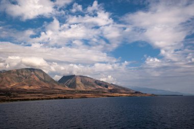 West coast ocean shoreline with 2 mountains near Lahaina, Maui, 