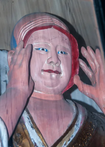 中国奉都 2010年5月8日 历史圣地 红衬里 红嘴唇手牵手的粉红皮肤男性雕像头像的遮掩 — 图库照片