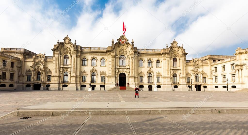 Guards at Palacio de Gobierno, Government Palace building exterior entrance, peruvian flag coat of arms, Main Square Lima city historical center architecture, Peru travel destination tourism, South America.