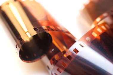 Old camera film on isolated white background