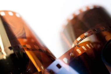 Old camera film on isolated white background