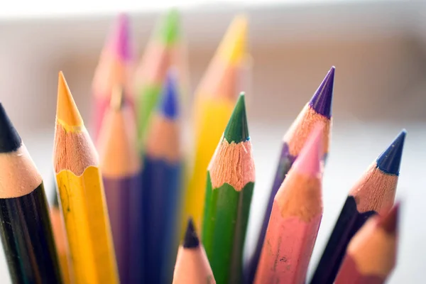 Color pencils with a blurry background — Stok fotoğraf