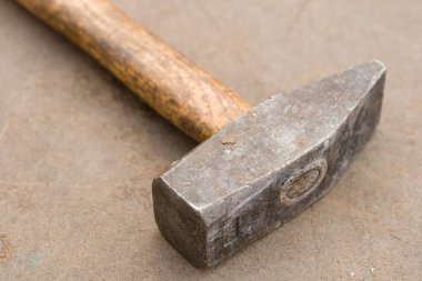Old hammer in a carpenter's shop