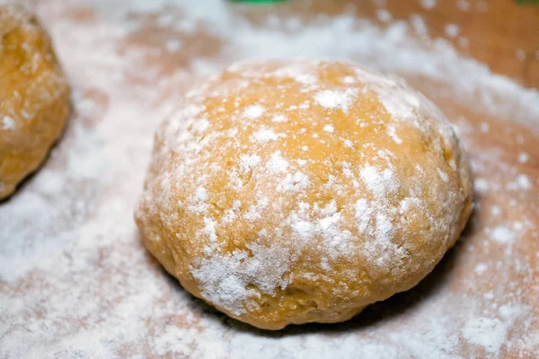 Fresh raw dough on a wood pastry board — 스톡 사진