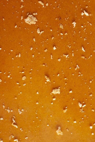 Breadcrumbs on a red surface