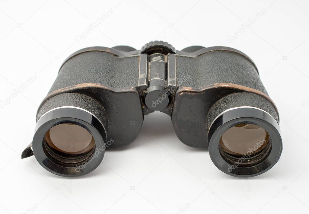 Old binocular isolated on white background