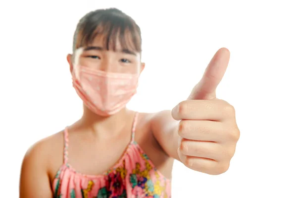 Asian Girl Showing Her Positive Sign Wearing Mask Focus Hand — Stok Foto