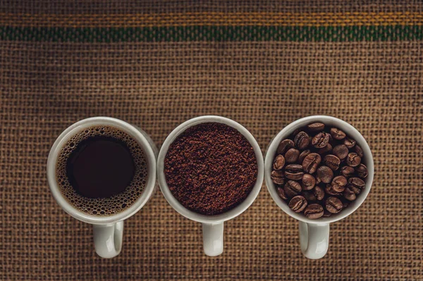 Café Brasileiro Estado Líquido Feijão Fundo Juta Vista Superior — Fotografia de Stock