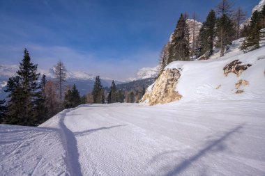 Ski slopes and snow holidays in Cortina d'Ampezzo in the Italian Dolomites, ski resort in the Alps clipart