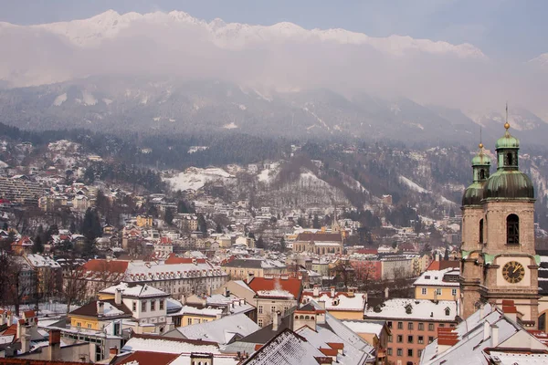 Innsbruck in winter, Austria. Beautiful aerial panoramic view, mountains covered with snow in the background — Stock Photo, Image