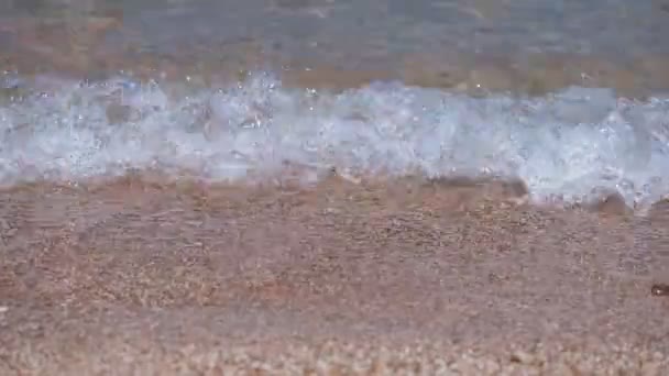 Close-up waves on sandy beach — ストック動画