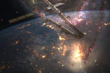 Dünya gezegeni ve uzay istasyonu. Bu görüntünün elementleri Nasa tarafından döşenmiştir