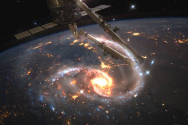 Dünya gezegeni ve uzay istasyonu. Bu görüntünün elementleri Nasa tarafından döşenmiştir