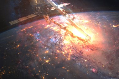 Dünya gezegeni ve uzay istasyonu yörüngede. Kozmik sanat. Bu görüntünün elementleri Nasa tarafından döşenmiştir