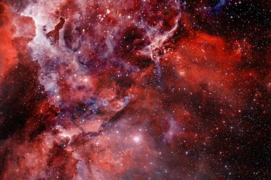 Derin uzayda yıldızların ve galaksilerin olduğu evren sahnesi uzay keşiflerinin güzelliğini gösteriyor. Nasa tarafından döşenmiş elementler.