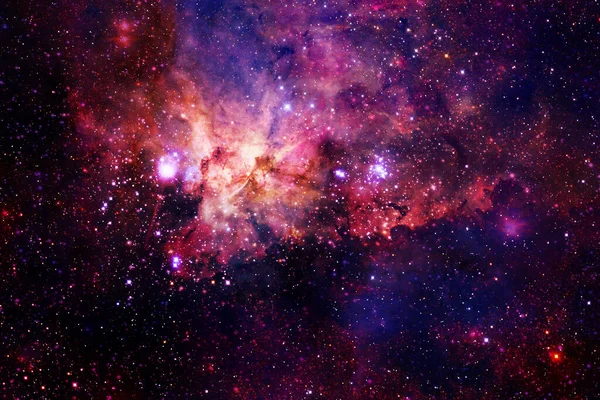 Nebula 'lar, galaksiler ve yıldızlar güzel bir kompozisyonda. Duvar kağıdı için harika bir baskı. Bu görüntünün elementleri Nasa tarafından döşenmiştir.