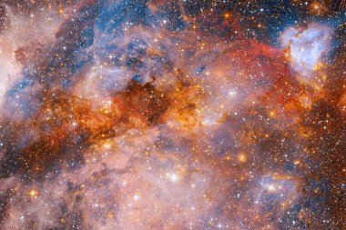 Uzayın derinliklerinde bir yıldız kümesi. Samanyolu Galaksisi. Bu görüntünün elementleri Nasa tarafından döşenmiştir.