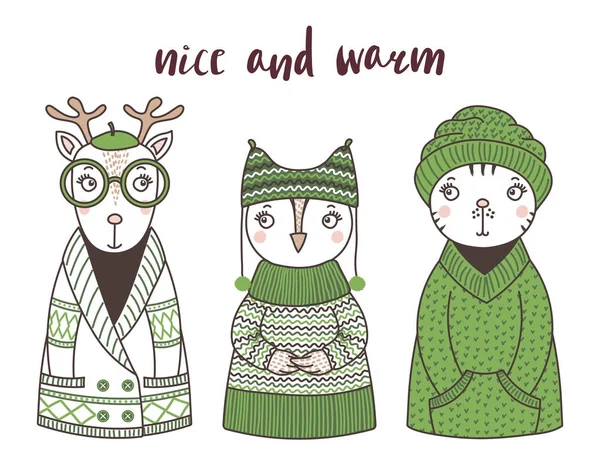 Cute funny animals in knitted hats and sweaters — Stock Vector