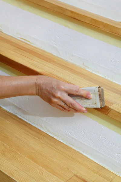 Wooden stairs sanding, home renovation — Stock Photo, Image