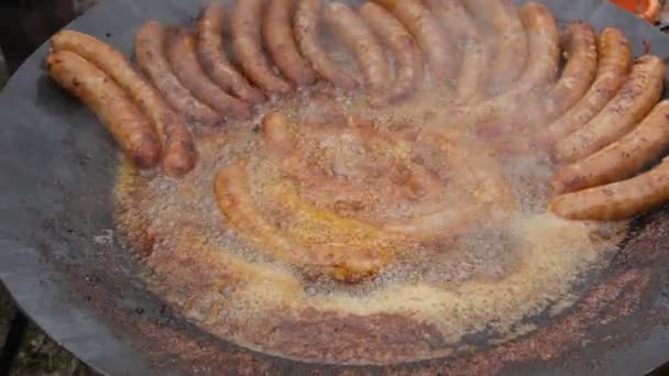 Pork Sausage Roasting Pan Traditional Food Preparing Handheld Footage — Stock Video