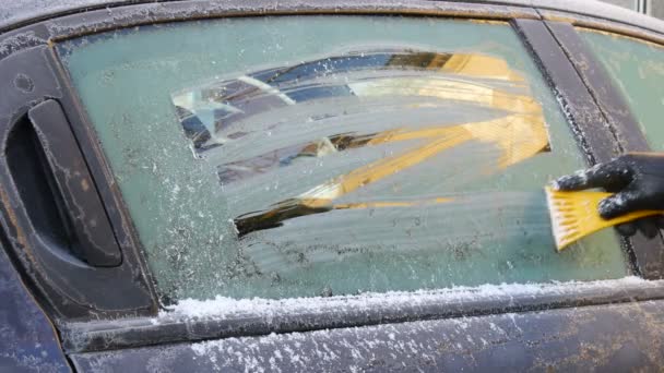 Driver Cleaning Frozen Ice Car Glass Using Scraper Window Ice — Stock Video