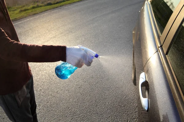 Young Driver Protective Gloves Spraying Antibacterial Cleaning Solution Sprayer Bottle — Stock Photo, Image