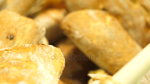 Fresh, crusty bread lying in a box, Close up — Stock Video