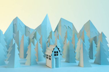 Gün batımında dağda bir evin olduğu bir kış kağıdı manzarası.