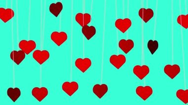 Animated red hearts shapes hanging from threads on turquoise background